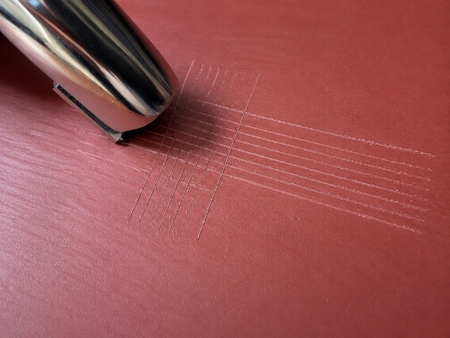 Cross-cut adhesion testing according to ISO 2409
