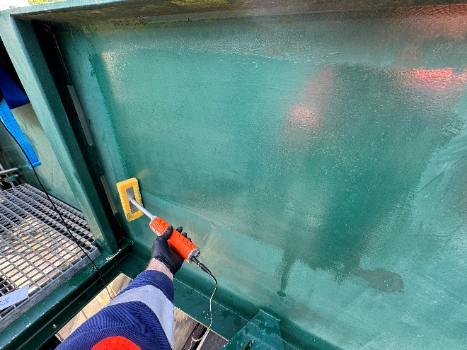 Detection of coating discontinuities using a low-voltage wet sponge tester